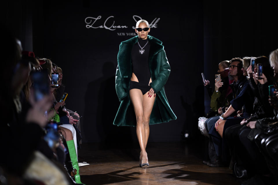 The LaQuan Smith Fall/Winter 2022 collection is modeled at 60 Pine Street during New York Fashion Week on Monday, Feb. 14, 2022, in New York. (Photo by Charles Sykes/Invision/AP)