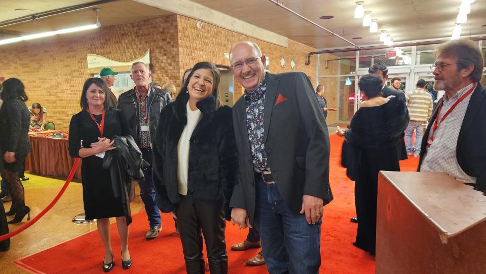 Attendees travel the red carpet Thursday at the "What Remains" premiere  at the Globe-News Center for the Performing Arts in downtown Amarillo.