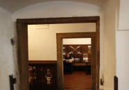 A man enjoys his lunch at a pub in Prague, Czech Republic, Thursday, Dec. 3, 2020. A sign of normalcy has returned to the Czech Republic ahead of the Christmas period after the government eased some of its most restrictive measures imposed to contain the recent massive surge of coronavirus infections. On Thursday all stores, shopping malls, restaurants, bars and hotels were allowed to reopen. (AP Photo/Petr David Josek)