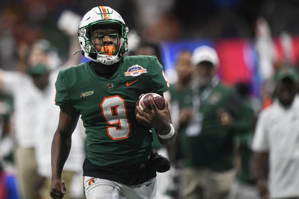 December 16, 2023;  Atlanta, Georgia, USA;  Florida A&M running back Kelvin Dean runs the ball during the Cricket Celebration Bowl game between Florida A&M University and Howard University at Mercedes-Benz Stadium.  FAMU defeated Howard 30-26.  Mandatory Credit: Katie Goodale-USA TODAY Network