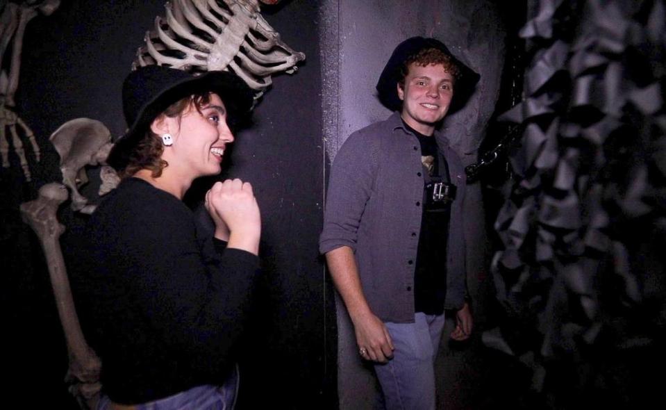 Tribune reporters Stephanie Zappelli and John Lynch carefully navigate a corner at The Haunt, keeping an eye out for vampires.