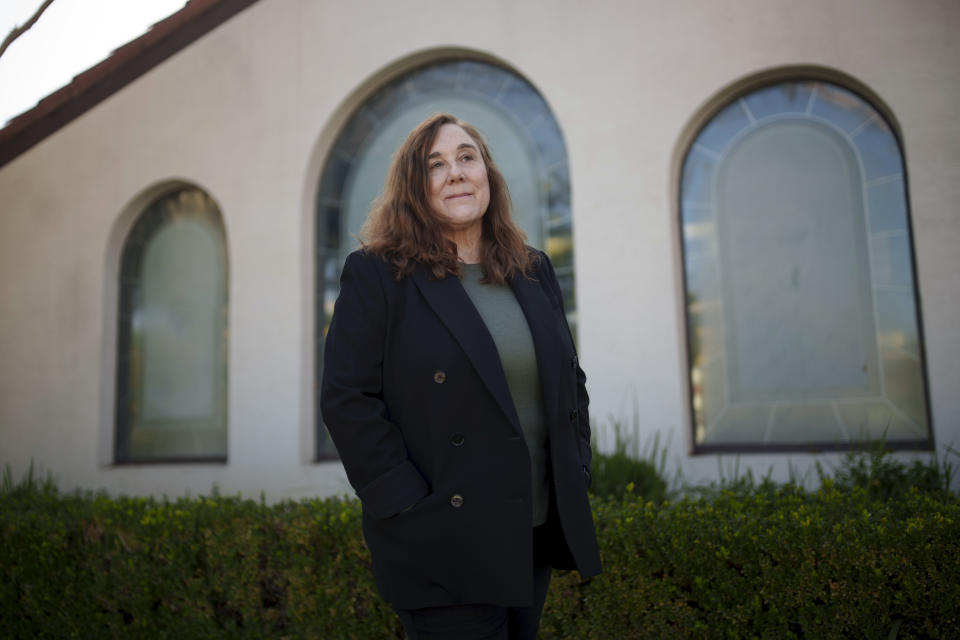 Gabrielle Longhi poses for a portrait, Friday, March 8, 2024, in Los Angeles. In a recent lawsuit, Longhi alleges she was sexually abused at Stone Ridge School of the Sacred Heart in Bethesda, Maryland. The sexual abuse of children by Catholic nuns often has been overlooked in the Catholic clergy abuse crisis, but survivors of nun abuse hope to raise awareness of the issue. (AP Photo/Eric Thayer)