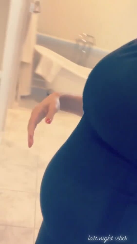 Nikki Bella is one stylish mom-to-be as she shows off a hint of baby bump