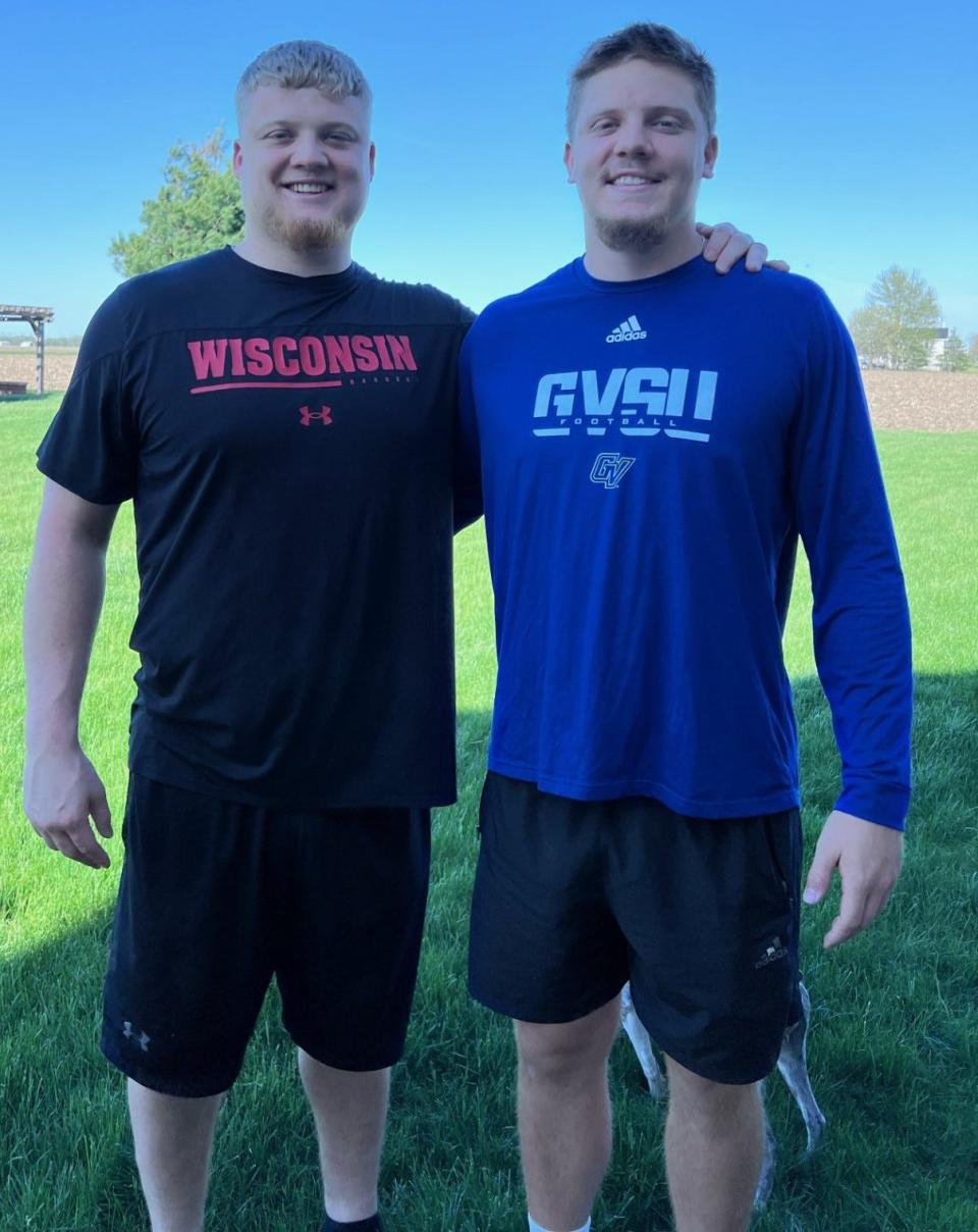 Brothers and Milan graduates Michael and Evan Furtney often work out together. Michael recently completed his career as an offensive lineman at Wisconsin. Evan is a tight end for Grand Valley State University.