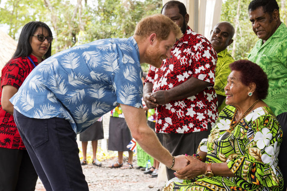 The Duke of Sussex meets Litiana Vulaca, 86, who served tea to Queen Elizabeth II on her visit in 1953, at a dedication of the Colo-i-Suva forest to the Queen's Commonwealth Canopy in Suva, Fiji, Wednesday, Oct. 24, 2018. Prince Harry and his wife Meghan are on day nine of their 16-day tour of Australia and the South Pacific. (Dominic Lipinski/Pool Photo via AP)