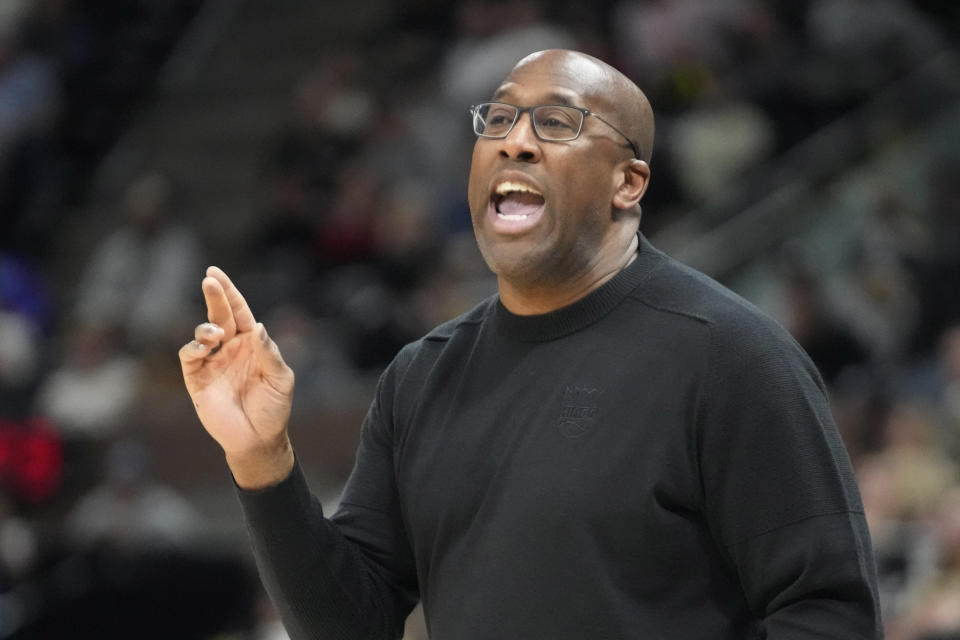 Sacramento Kings head coach Mike Brown directs his team during the first half of an NBA basketball game against the Utah Jazz, Monday, March 20, 2023, in Salt Lake City. (AP Photo/Rick Bowmer)