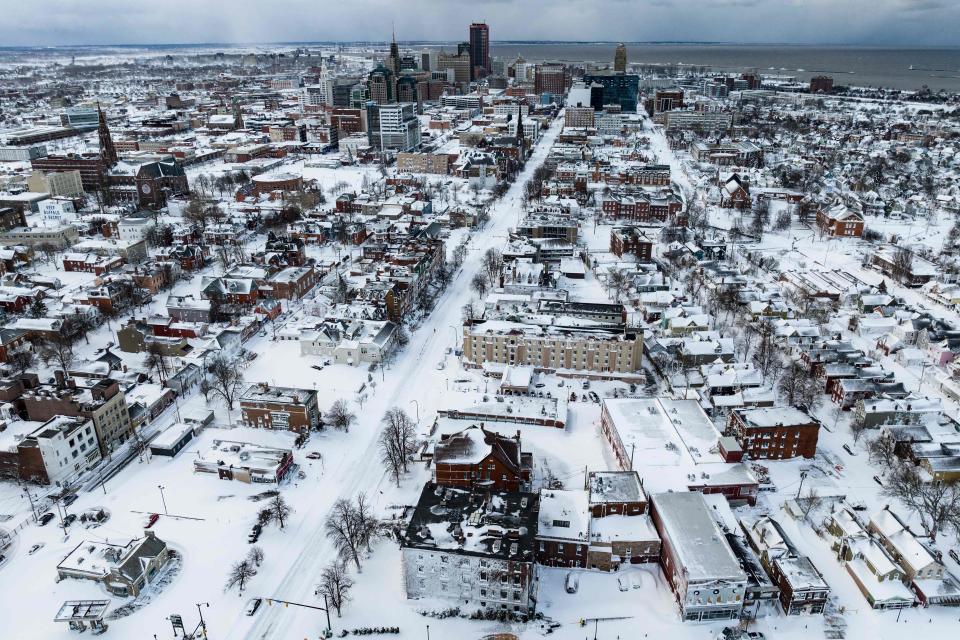 Snow blankets the city in this aerial drone photograph in Buffalo, New York, on December 25, 2022.