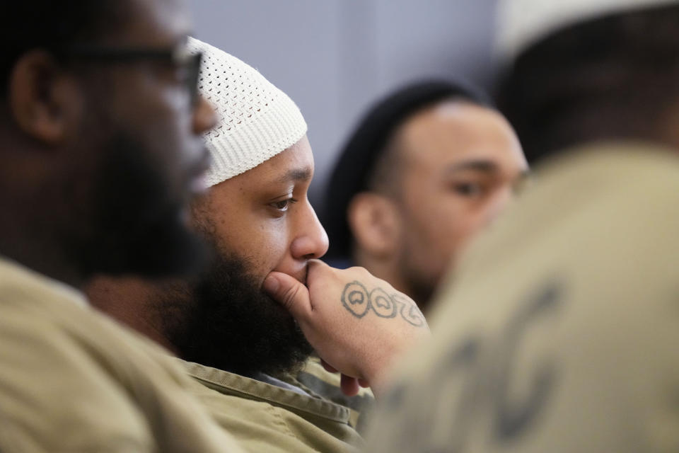 Nicholas Harris, detainee in Division Of Correction 11, and other detainees listen to Sister Helen Prejean during a book club at Department Of Corrections Division 11 in Chicago, Monday, April 22, 2024. DePaul students and detainees are currently reading Dead Man Walking and the author, anti death penalty advocate, Sister Helen Prejean attended to lead a discussion. (AP Photo/Nam Y. Huh)