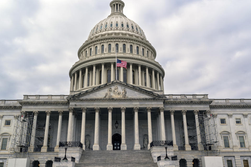 The American flag flies at half staff at the U.S. Capitol in Washington, Tuesday, Nov. 29, 2022, in honor of Rep. Donald McEachin, D-Va., who died Monday at the age of 61 after a battle with colorectal cancer. He won reelection to a fourth term earlier this month in Virginia's 4th Congressional District, which includes part of Richmond and extends south to the North Carolina border. (AP Photo/J. Scott Applewhite)
