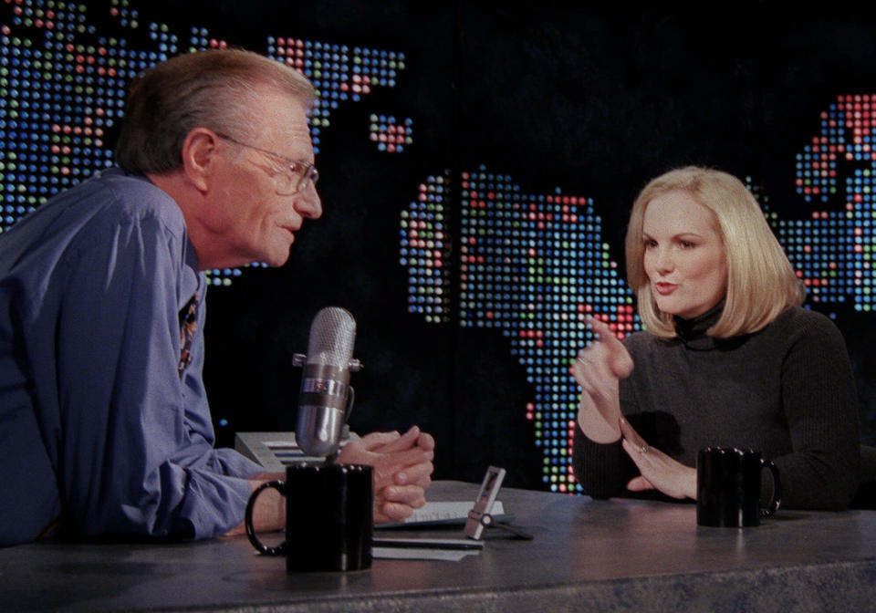 FILE - In this Jan. 31, 2001 file photo, Patricia Hearst Shaw gestures toward talk show host Larry King on the set of CNN's "Larry King Live," in New York. King, who interviewed presidents, movie stars and ordinary Joes during a half-century in broadcasting, has died at age 87. Ora Media, the studio and network he co-founded, tweeted that King died Saturday, Jan. 23, 2021 morning at Cedars-Sinai Medical Center in Los Angeles. (AP Photo/Tina Fineberg, File)