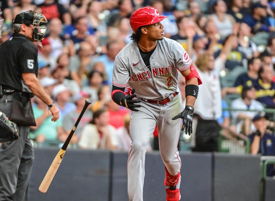 Aug 6, 2022; Milwaukee, Wisconsin, USA;  Cincinnati Reds shortstop Jose Barrero (2) watches after hitting a two-run home run in the fourth inning against the Milwaukee Brewers at American Family Field. Mandatory Credit: Benny Sieu-USA TODAY Sports