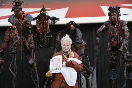 British fashion designer Vivienne Westwood attends an unveiling of a billboard against fracking in central London, Britain, April 27, 2015. REUTERS/Stefan Wermuth