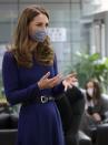 <p>The Duchess of Cambridge visited the Institute of Reproductive and Development Biology at London's Imperial College. Though she wore a white lab coat for most of the day, underneath, Kate sported an indigo, long-sleeved Emilia Wickstead dress, with a black belt and blue floral mask. </p><p><a class="link " href="https://go.redirectingat.com?id=74968X1596630&url=https%3A%2F%2Fwww.net-a-porter.com%2Fen-us%2Fshop%2Fproduct%2Femilia-wickstead%2Fjorgie-ruched-cloque-midi-dress%2F1262324&sref=https%3A%2F%2Fwww.townandcountrymag.com%2Fstyle%2Ffashion-trends%2Fnews%2Fg1633%2Fkate-middleton-fashion%2F" rel="nofollow noopener" target="_blank" data-ylk="slk:Shop a Similar Style;elm:context_link;itc:0;sec:content-canvas">Shop a Similar Style</a></p>