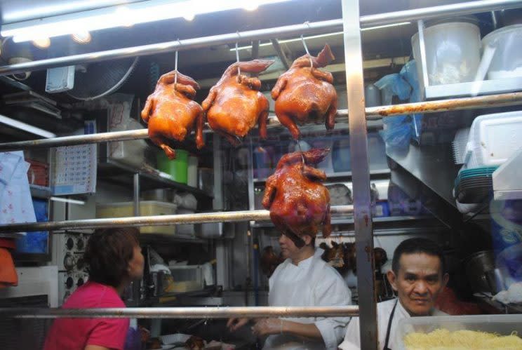 Chef Chan at his original Hong Kong Soya Sauce Chicken Rice and Noodle hawker stall at Chinatown Market and Food Center.