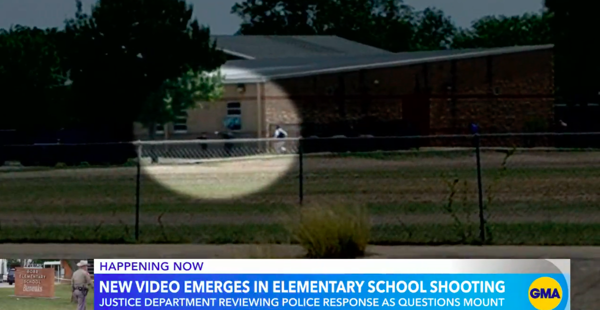 Students from Robb Elementary flee through broken windows and backdoors as police guide them away to safety from the site of the Uvalde school shooting. (ABC News/video screengrab)