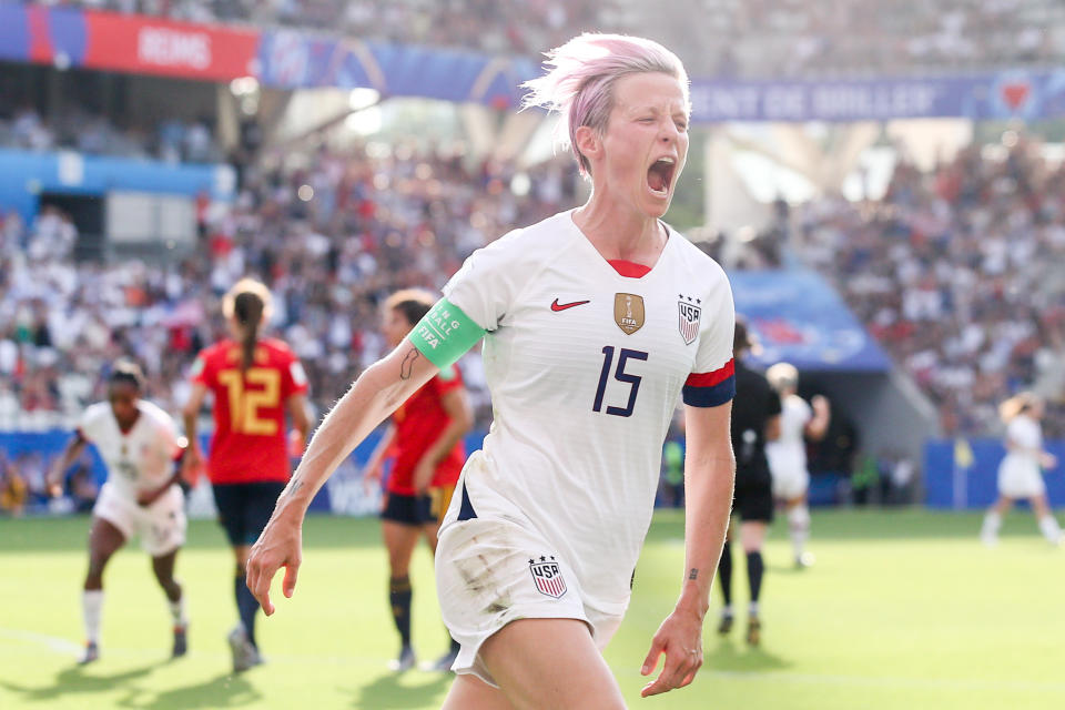 Megan Rapinoe #15 of USA celebrates her the second goal by penalty during the 2019 FIFA Women's World Cup France Round Of 16 match between Spain and USA at Stade Auguste Delaune on June 24, 2019 in Reims, France. (Photo by Zhizhao Wu/Getty Images)