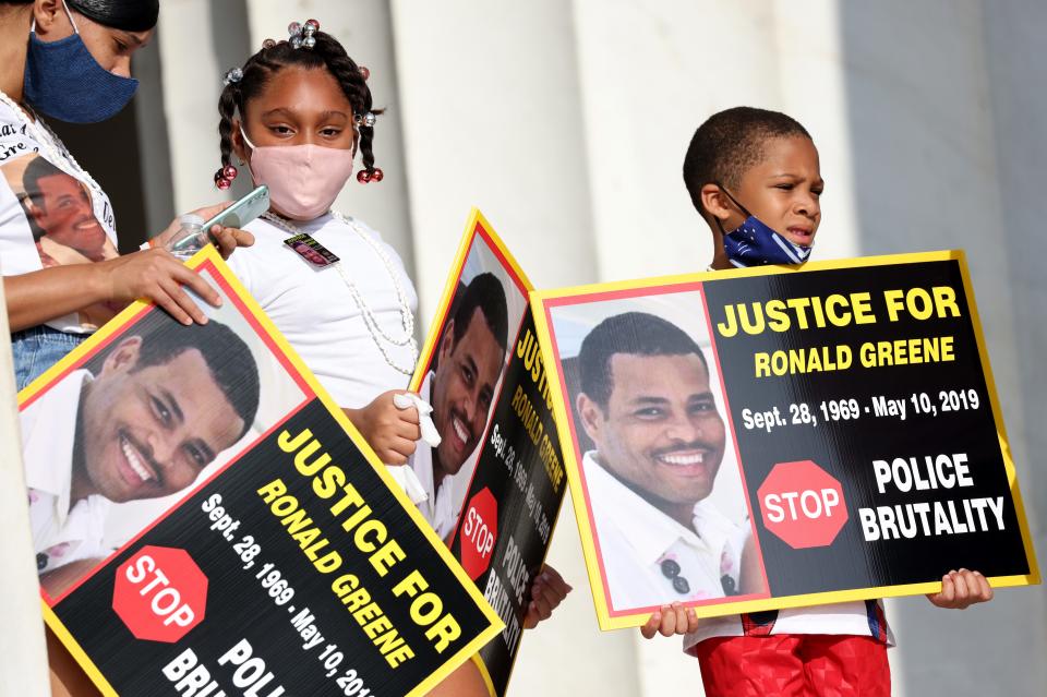 Family members of Ronald Greene, who was beaten during a deadly arrest in 2019, gather at the Lincoln Memorial for the March on Washington in 2020.