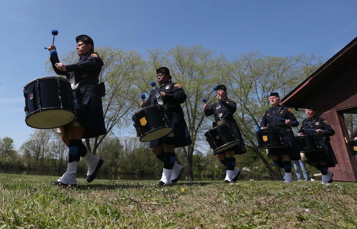Members of the Cleveland Police Pipes and Drums perform during the Akron Police Memorial Day ceremony at the Fraternal Order of Police Akron Lodge 7 on Wednesday. 