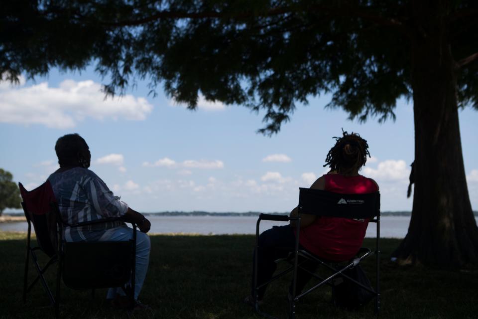 Kandi Saundras-Davis, right, and Beverly Barnes look out at the water at Battery Park Tuesday, June 29, 2021. 