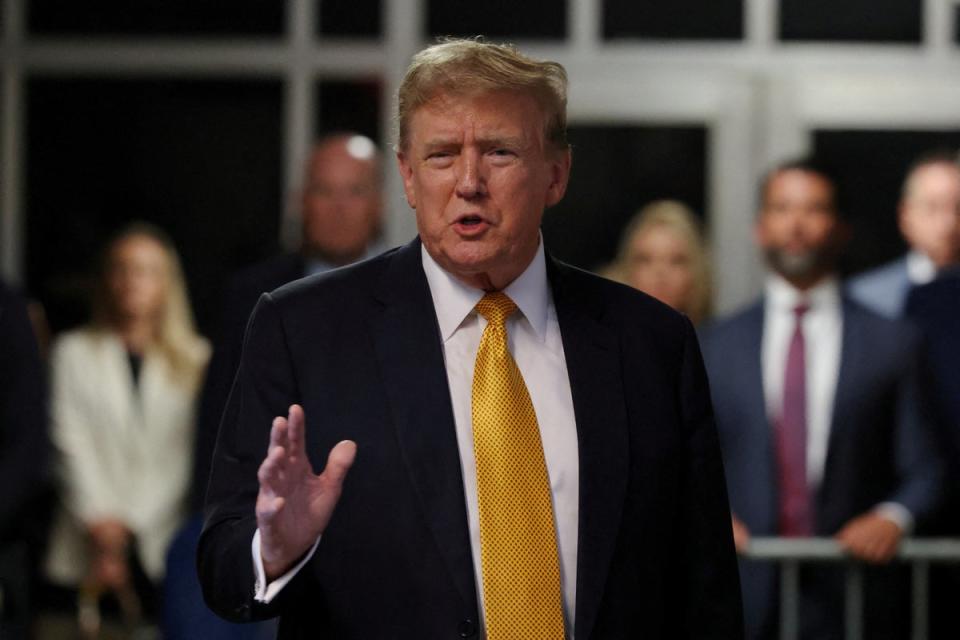 Donald Trump speaks after a break during his hush money trial at the Manhattan Criminal Court in New York City on 21 May (via REUTERS)