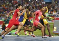 <p>Usain Bolt (JAM) of Jamaica leads the pack during the race. REUTERS/Alessandro Bianchi </p>