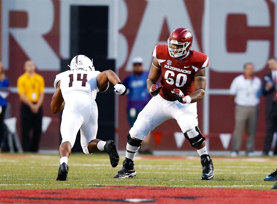 SEP 17, 2016: Arkansas offensive lineman Brian Wallace #60 steps to block Easy Anyama #14 from Texas State. .The Arkansas Razorbacks defeated Texas State Bobcats 42-3 at Donald W. Reynolds Stadium in Fayetteville, AR, Richey Miller/CSM (Cal Sport Media via AP Images)