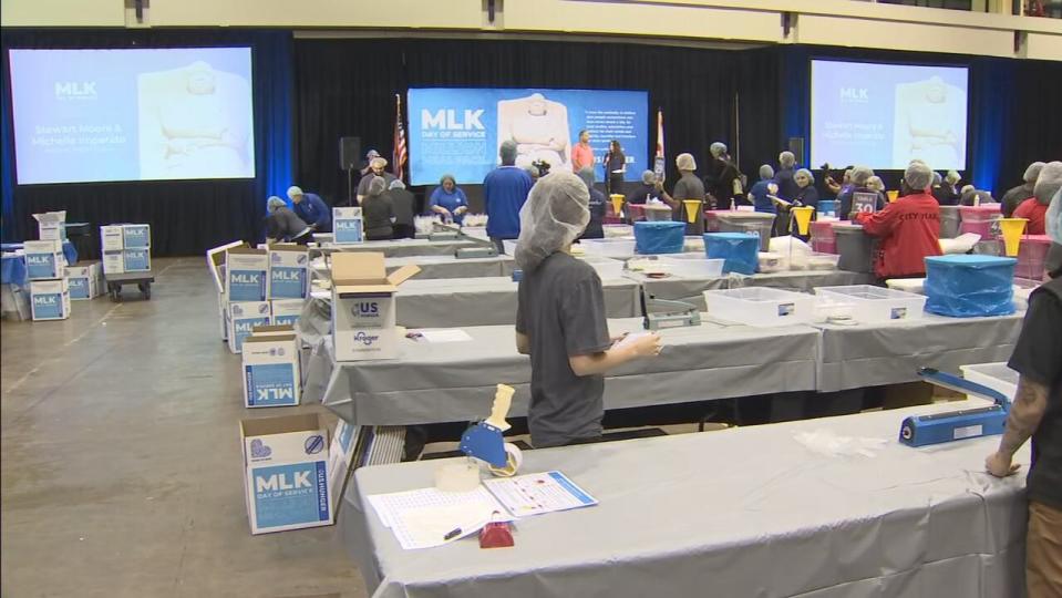 Many families honored Dr. Martin Luther King Jr. by helping others at the Orange County Convention Center.