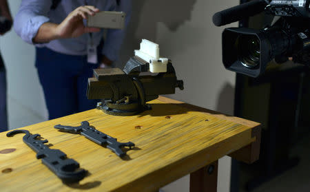 A table used to mount the rifle seized from one of the suspects in the murder of activist and councilwoman Marielle Franco, is presented at the police homicide department in Rio de Janeiro, Brazil March 13, 2019. REUTERS/Lucas Landau