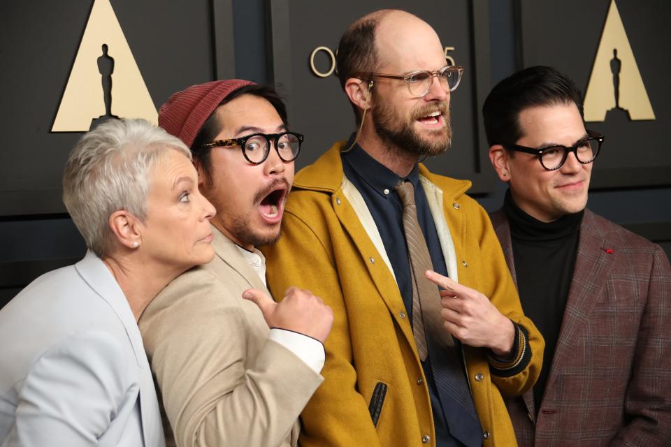 Jamie Lee Curtis photo bombs Best Director nominees, left to right, Daniel Kwan, Daniel Scheinert and Producer Jonathan Wang.