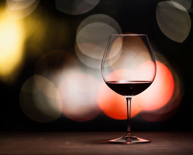 A Burgundy glass is shaped like a big, round fish bowl at the bottom. (Photo: Jay's photo via Getty Images)
