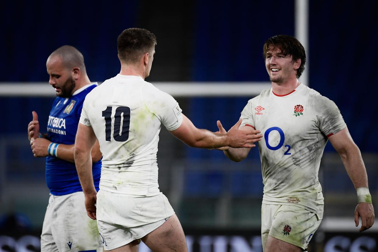 Owen Farrell congratulates Tom Curry after England beat Italy 34-5 (AFP via Getty)