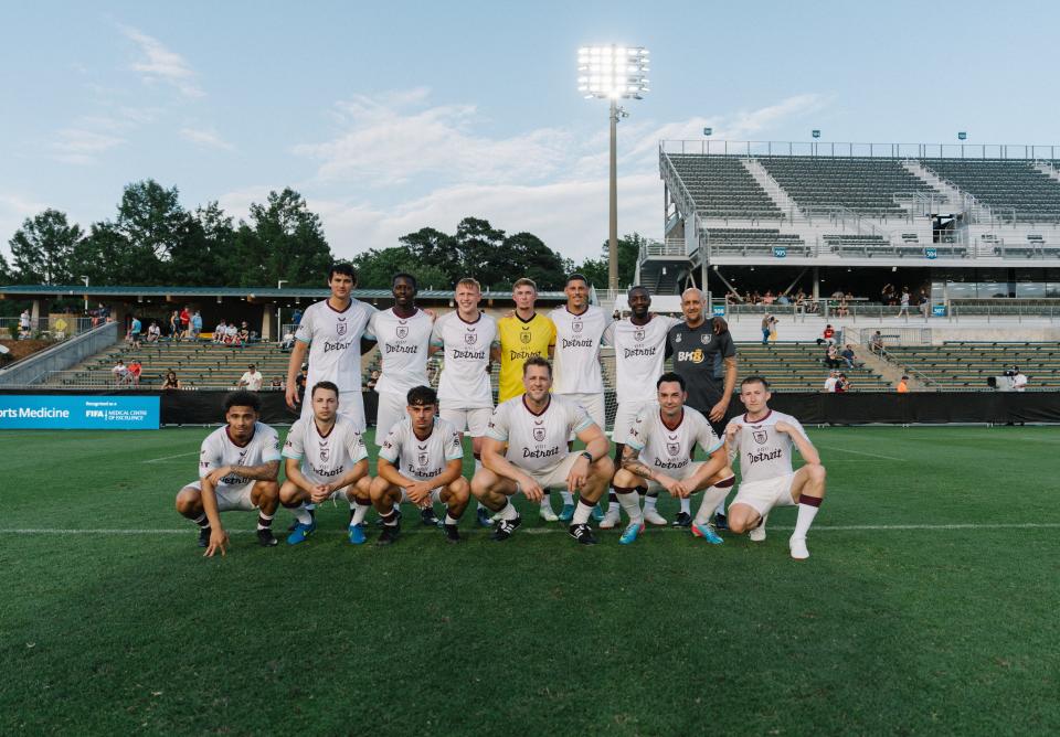 The Burnley pro-am team for The Soccer Tournament (TST) poses for a team photo of the starting 11.