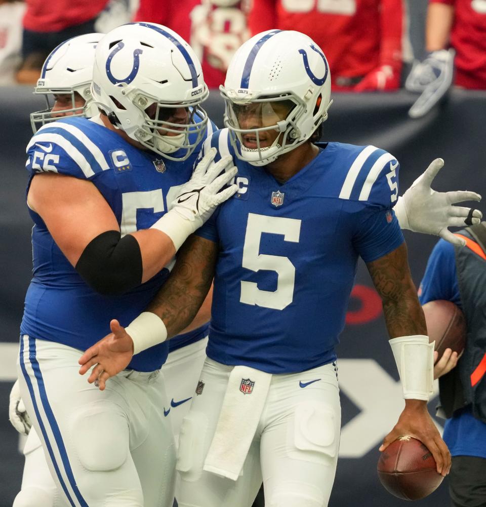 Indianapolis Colts guard Quenton Nelson (56) celebrates with Indianapolis Colts quarterback Anthony Richardson (5) after a touchdown Sunday, Sept. 17, 2023, during a game against the Houston Texans at NRG Stadium in Houston