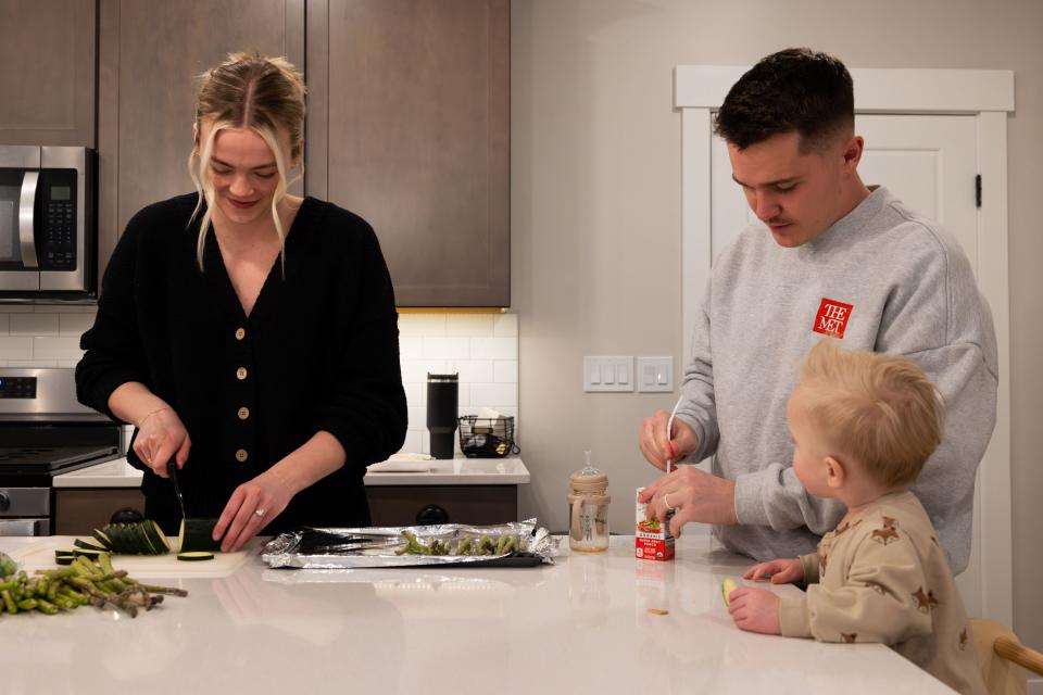 McCall and Cole Porter make dinner and feed their son Jack, 1, at their home in Saratoga Springs on Wednesday, Jan. 31, 2024. | Megan Nielsen, Deseret News