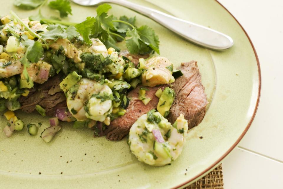 In this image taken on May 13, 2013, a recipe for pepper-lime flank steak with shrimp and salmon ceviche is displayed in Concord, N.H. (AP Photo/Matthew Mead)