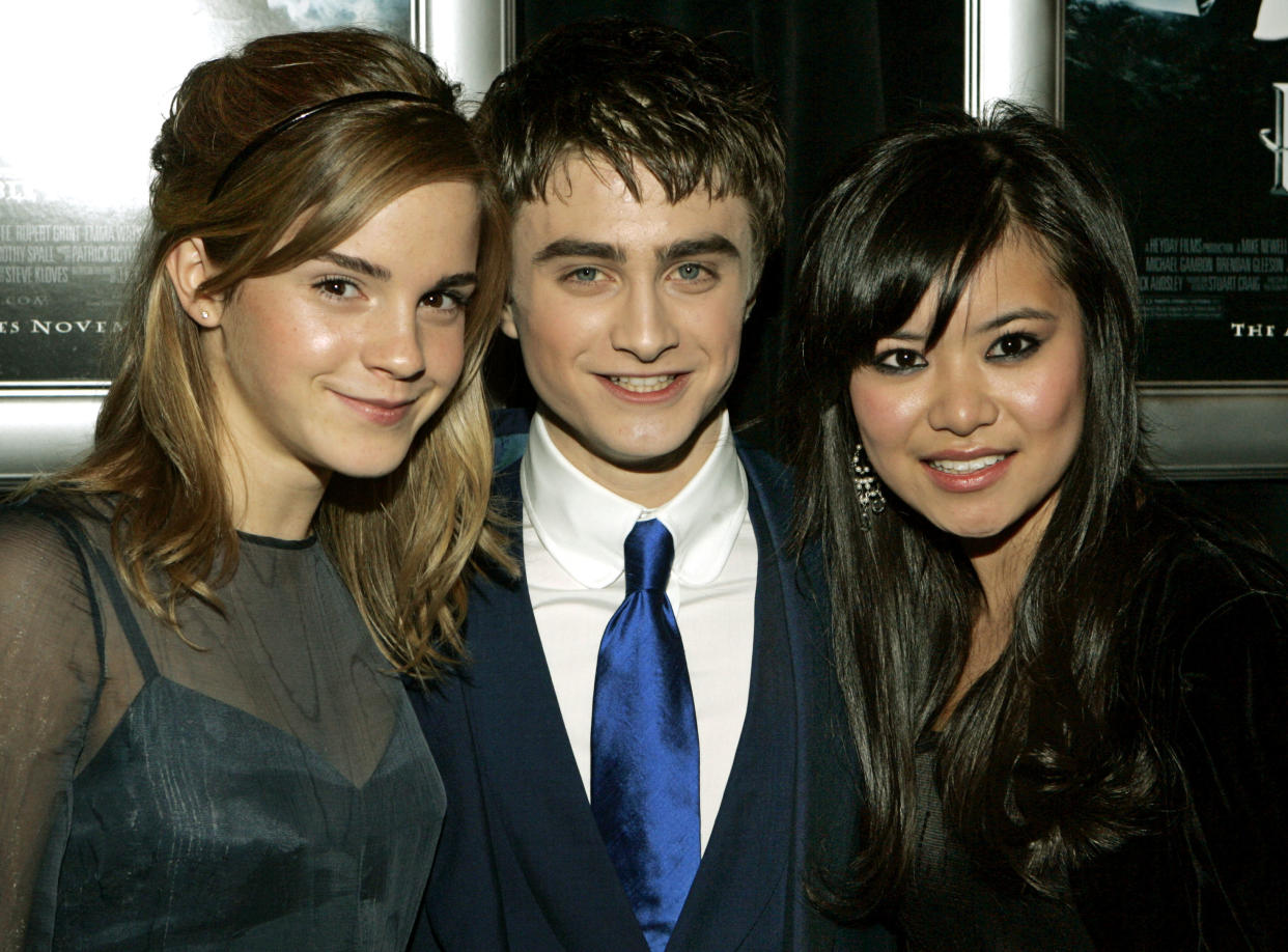 Harry Potter co-stars, from left, Emma Watson, Daniel Radcliffe, and Katie Leung, pose for photographers at the United States premiere of the film 