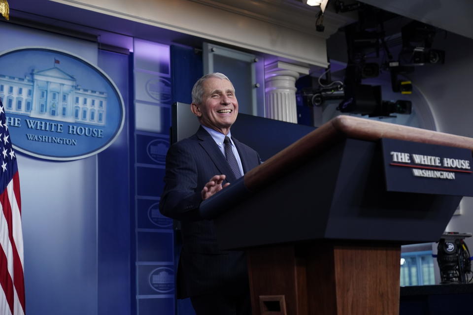 Dr. Anthony Fauci, director of the National Institute of Allergy and Infectious Diseases, laughs while speaking in the James Brady Press Briefing Room at the White House, Thursday, Jan. 21, 2021, in Washington. (AP Photo/Alex Brandon)