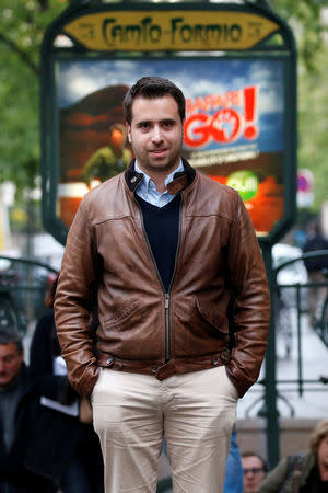 Aymeric Durox, a teacher and supporter of Marine Le Pen, French National Front (FN) candidate for 2017 presidential election, poses in front of a metro station in Paris, France, May 3, 2017. REUTERS/Charles Platiau