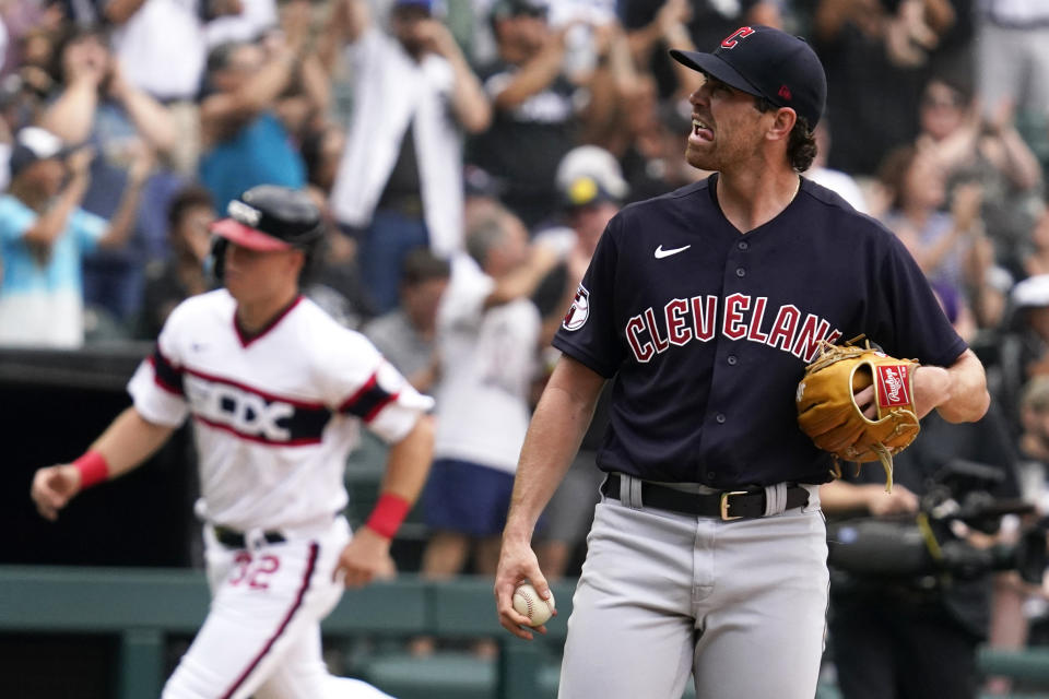 Cleveland Guardians starting pitcher Shane Bieber reacts as he looks up after Chicago White Sox's Leury Garcia hit a two-run home run during the second inning of a baseball game in Chicago, Sunday, July 24, 2022. (AP Photo/Nam Y. Huh)