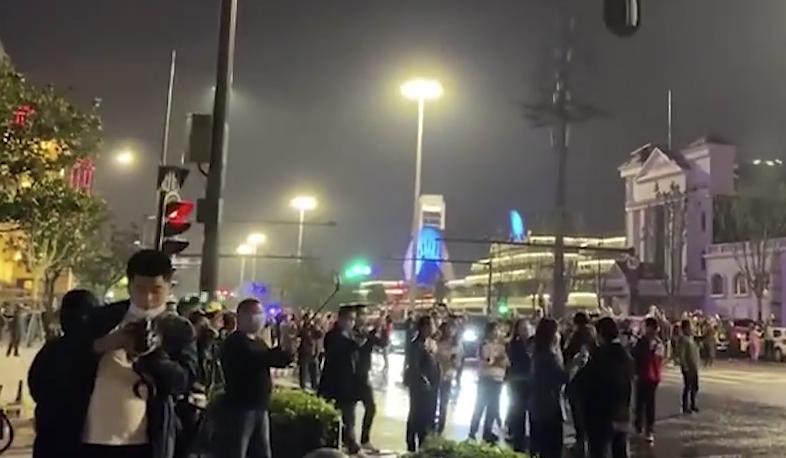 Hundreds gather on the streets of Wuhan at midnight to celebrate. Source: CCTV