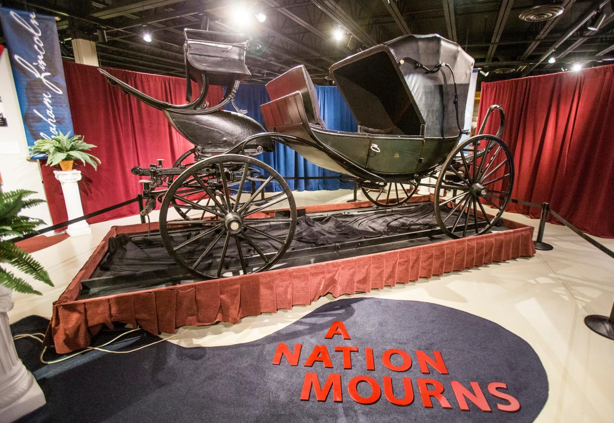 The carriage President Lincoln rode in on the night of his assassination is on display inside the new exhibit "Lincoln's Final Journey: A Nation Mourns" on Thursday, June 18, 2015, inside the Studebaker National Museum in South Bend.