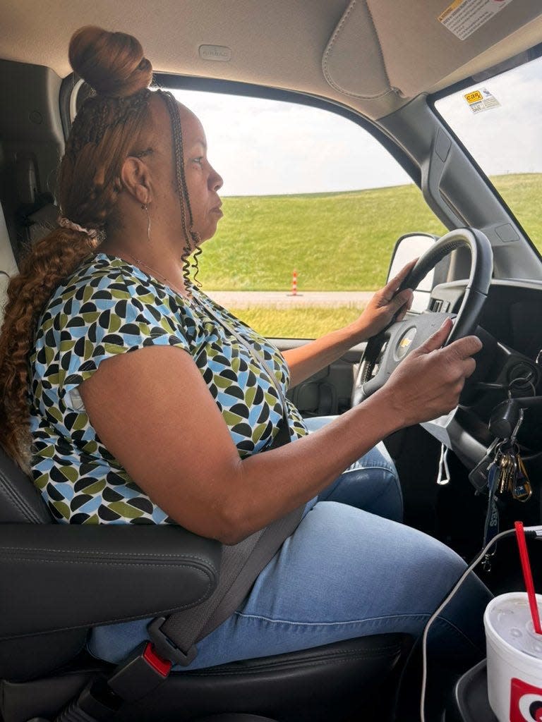 Dana James, publisher of Black Iowa News, driving the extended cargo van to pick up copies of first edition of the printed paper from the printer in northwestern Iowa. James is a recipient of the President's Volunteer Service Lifetime Achievement Award.