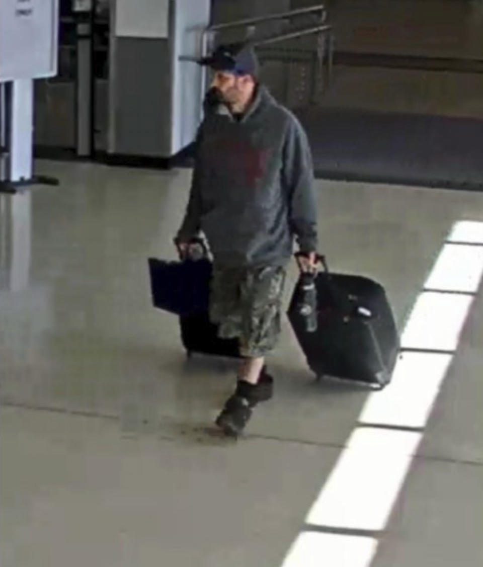 This airport surveillance camera image released in an FBI affidavit shows alleged suspect Marc Muffley at Lehigh Valley International Airport in Allenstown, Pa. on Monday, Feb. 27, 2023. Muffley was arrested Monday after an explosive was found in a bag checked onto a Florida-bound flight, federal authorities said. (FBI via AP)