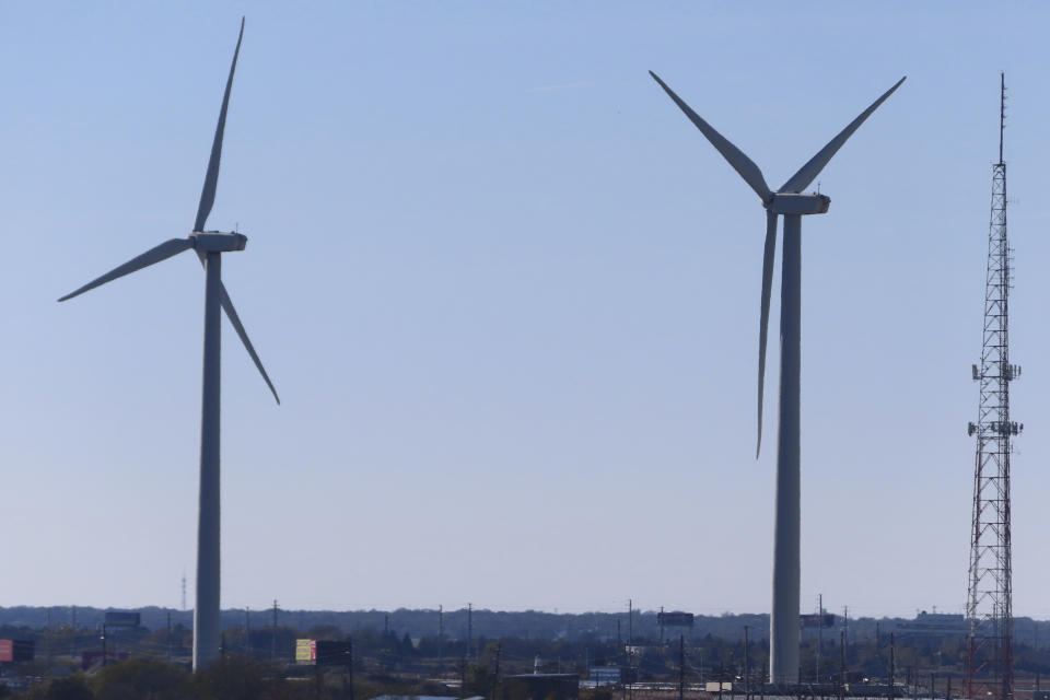 Land-based wind turbines spin in Atlantic City, N.J. on Nov. 3, 2023. On Jan. 24, 2024, New Jersey utilities regulators approved two additional offshore wind farms, bringing the state's number to three. (AP Photo/Wayne Parry)