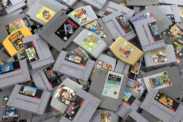 NES, SNES, and N64 cartridges that were usually grey and would give out a warm plasticky smell after you played with them: