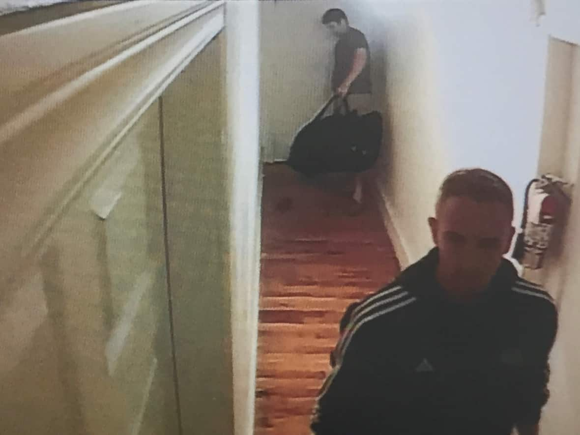 A still from surveillance video of William Sandeson's apartment hallway shown to the jury in the Halifax trial on Jan. 10, 2023.  (Nova Scotia Courts - image credit)