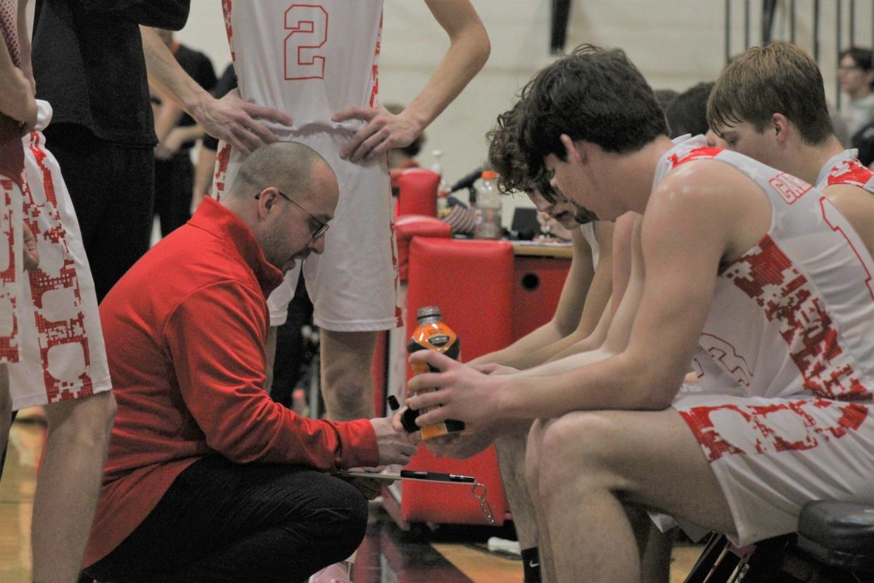 Onaway's Eddy Szymoniak, the Daily Tribune's 2023-24 Boys Basketball Coach of the Year, guided the Cardinals to a fourth consecutive district title this past season.