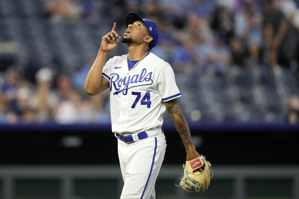 Kansas City Royals relief pitcher Jose Cuas looks to the sky after getting out of the sixth inning of a baseball game against the Detroit Tigers Tuesday, May 23, 2023, in Kansas City, Mo. (AP Photo/Charlie Riedel)