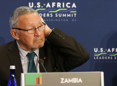 Zambia's Vice President Guy Scott (L) listens as U.S. President Barack Obama (not pictured) speaks, at the first Leaders' Session of the U.S.-Africa Leaders Summit, at the State Department in Washington, in this August 6, 2014 file picture. REUTERS/Larry Downing/Files