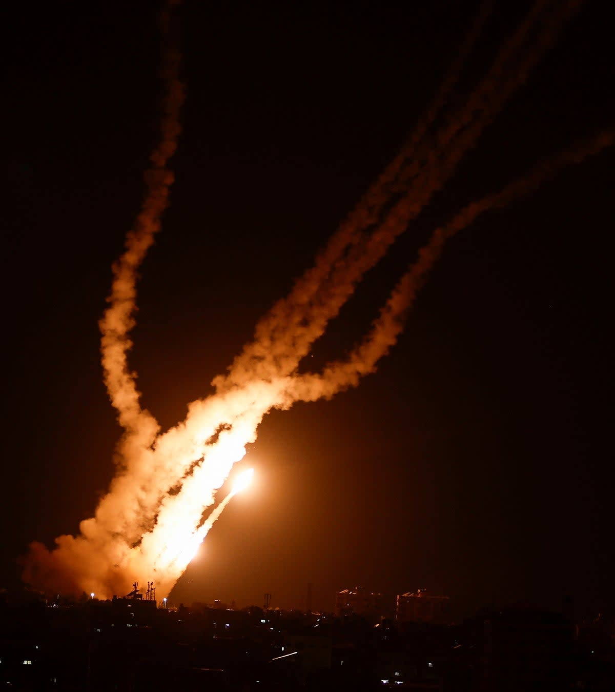 Rockets are fired from Gaza toward Israel (Reuters)